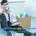 A man sitting on the floor with a box and a mask on talking on phone about emergency payday loans for unemployed