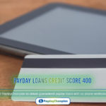 A credit card and a tablet computer, symbolizing online payday loans with a guaranteed credit score of 400 and no telecheck