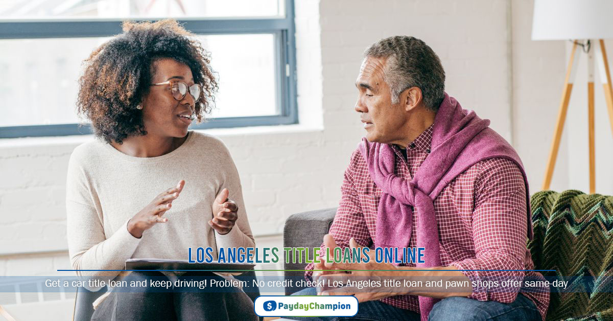 A man and woman sitting on a couch talking to each other about Los Angeles titleloan online