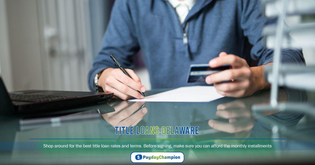 A man sitting at a desk writing on a piece of title loans Delaware agreement paper