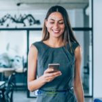 A woman is reading about online installment loans in Colorado