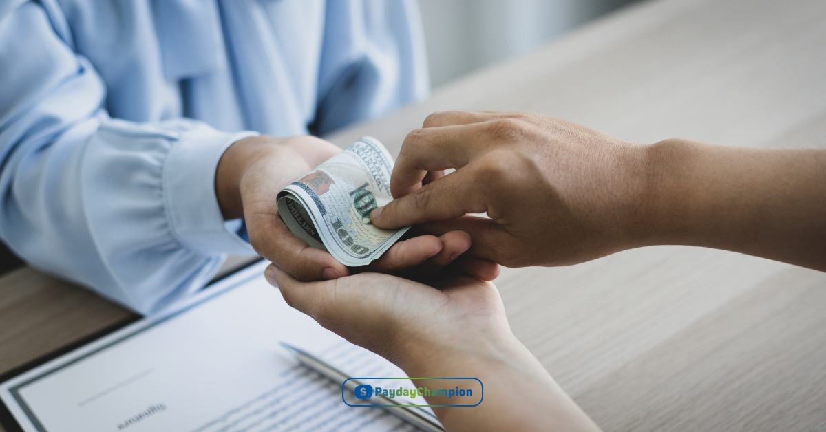 a person handing money to another person