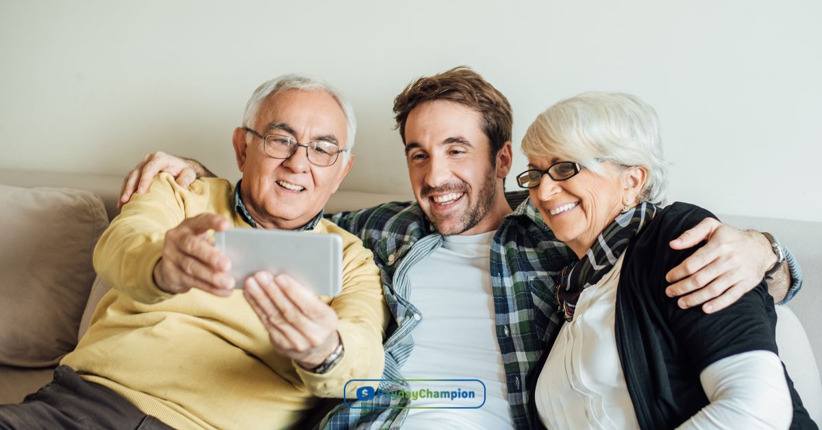 A couple of people sitting on a couch after obtaining parent loans online