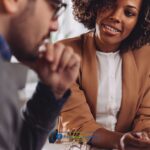 a man and a woman sitting at a table